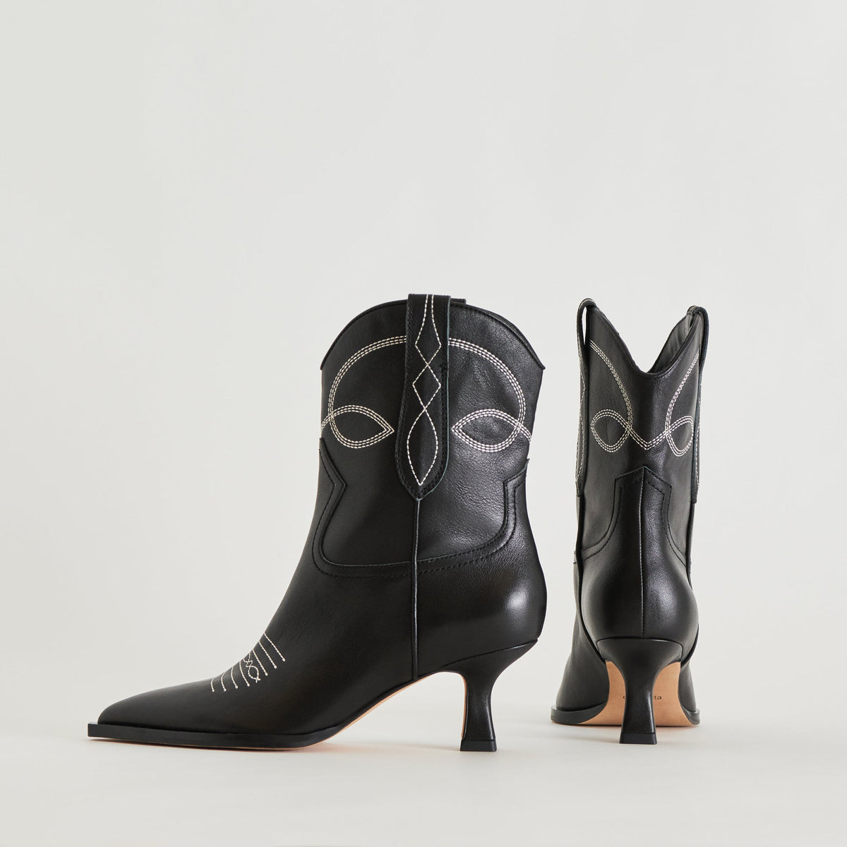 ANGEL BOOTIES BLACK WHITE LEATHER | Dolce Vita