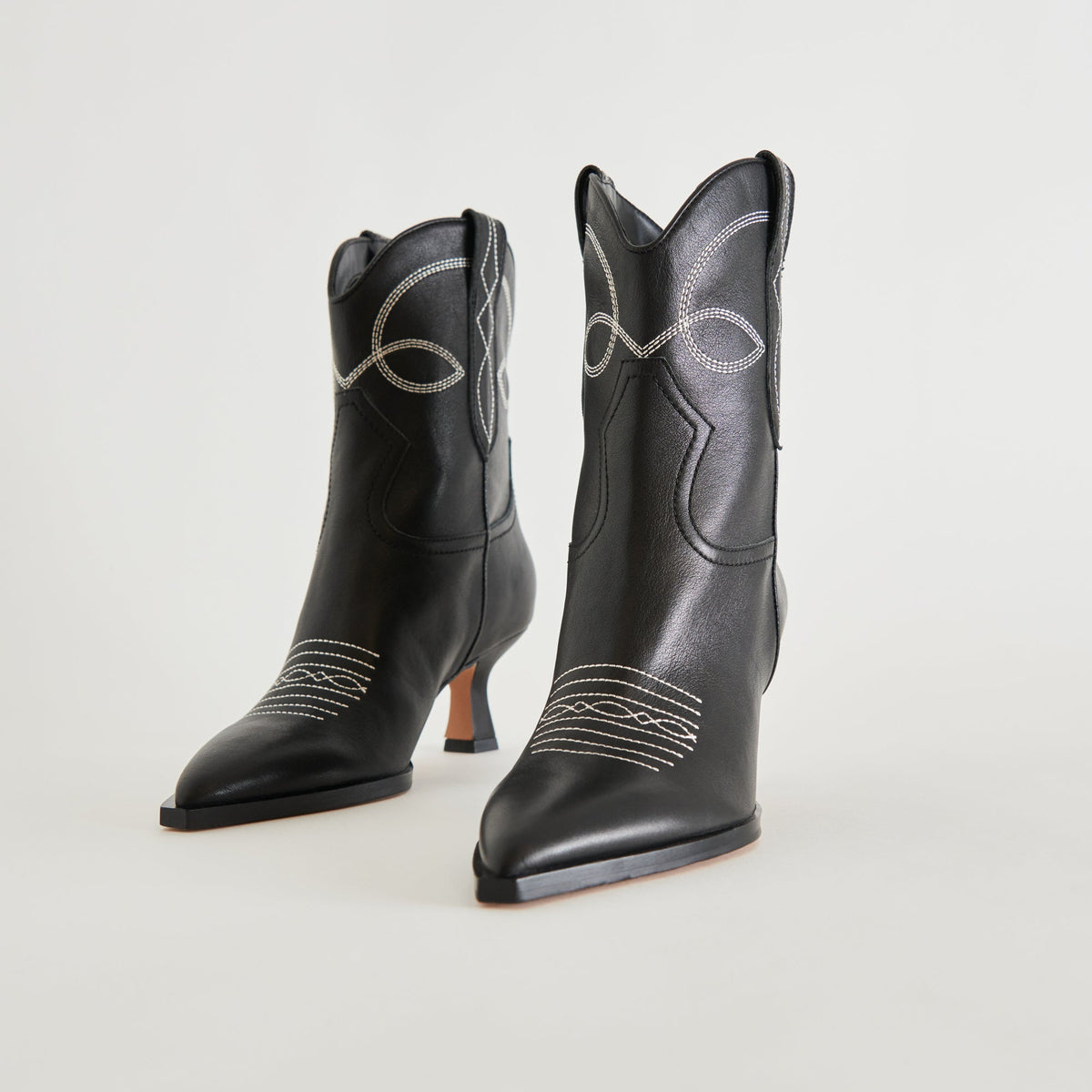 ANGEL BOOTIES BLACK WHITE LEATHER | Dolce Vita