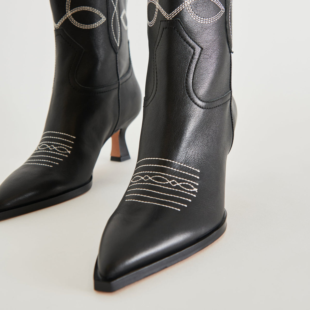ANGEL BOOTIES BLACK WHITE LEATHER | Dolce Vita