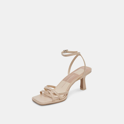 MANJI HEELS BONE PATENT LEATHER | Dolce Vita