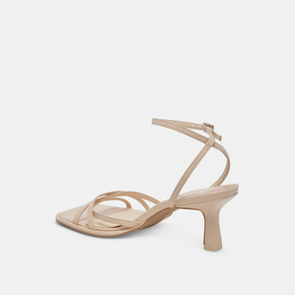 MANJI HEELS BONE PATENT LEATHER | Dolce Vita