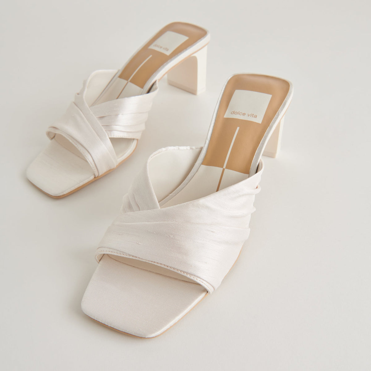 CARLAN HEELS OFF WHITE SILK | Dolce Vita