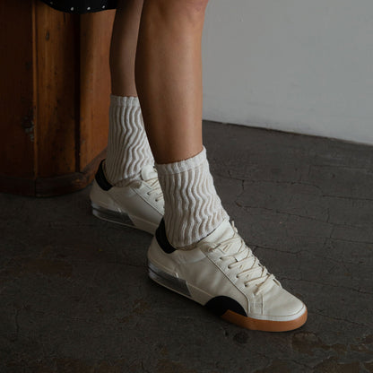ZINA SNEAKERS WHITE BLACK LEATHER | Dolce Vita