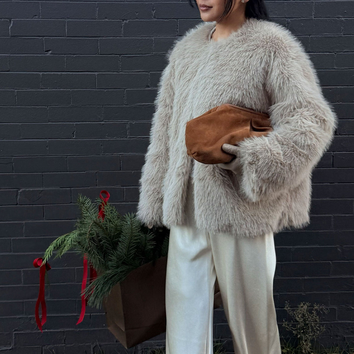 Sahara Cognac Suede Clutch | Dolce Vita