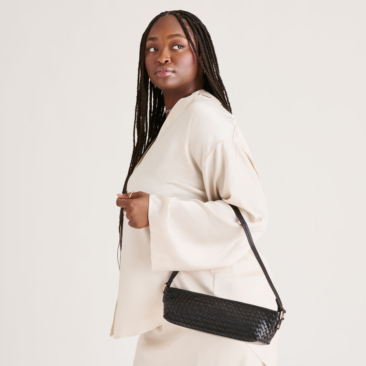 Savaii Black Woven Leather Shoulder Bag | Dolce Vita