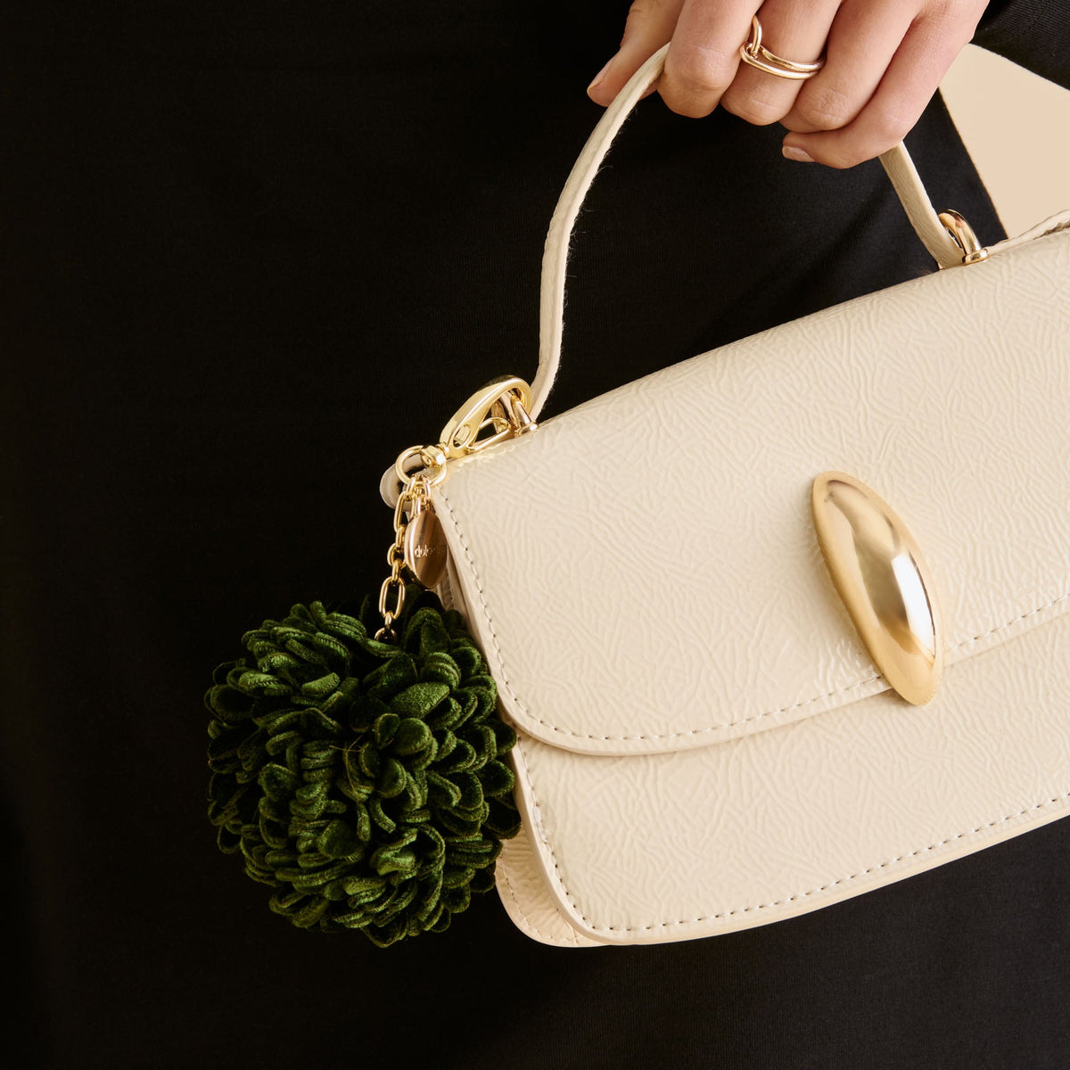 Pom Pom Dk Green Bag Charm | Dolce Vita