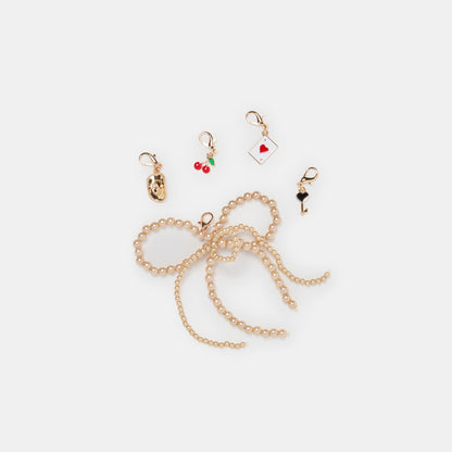 GOLD BOW CHARM PACKAGE ASSORTED | Dolce Vita